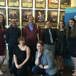 Students posing at reception